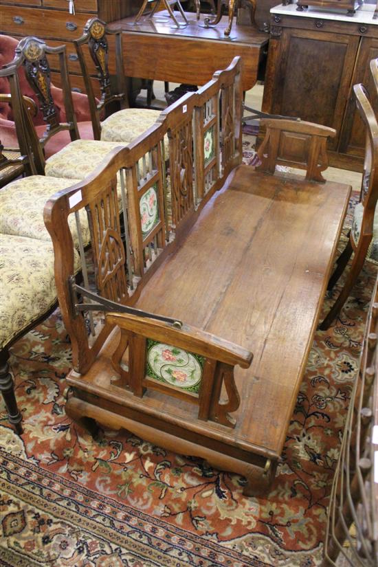 Victorian swing bench with tiles